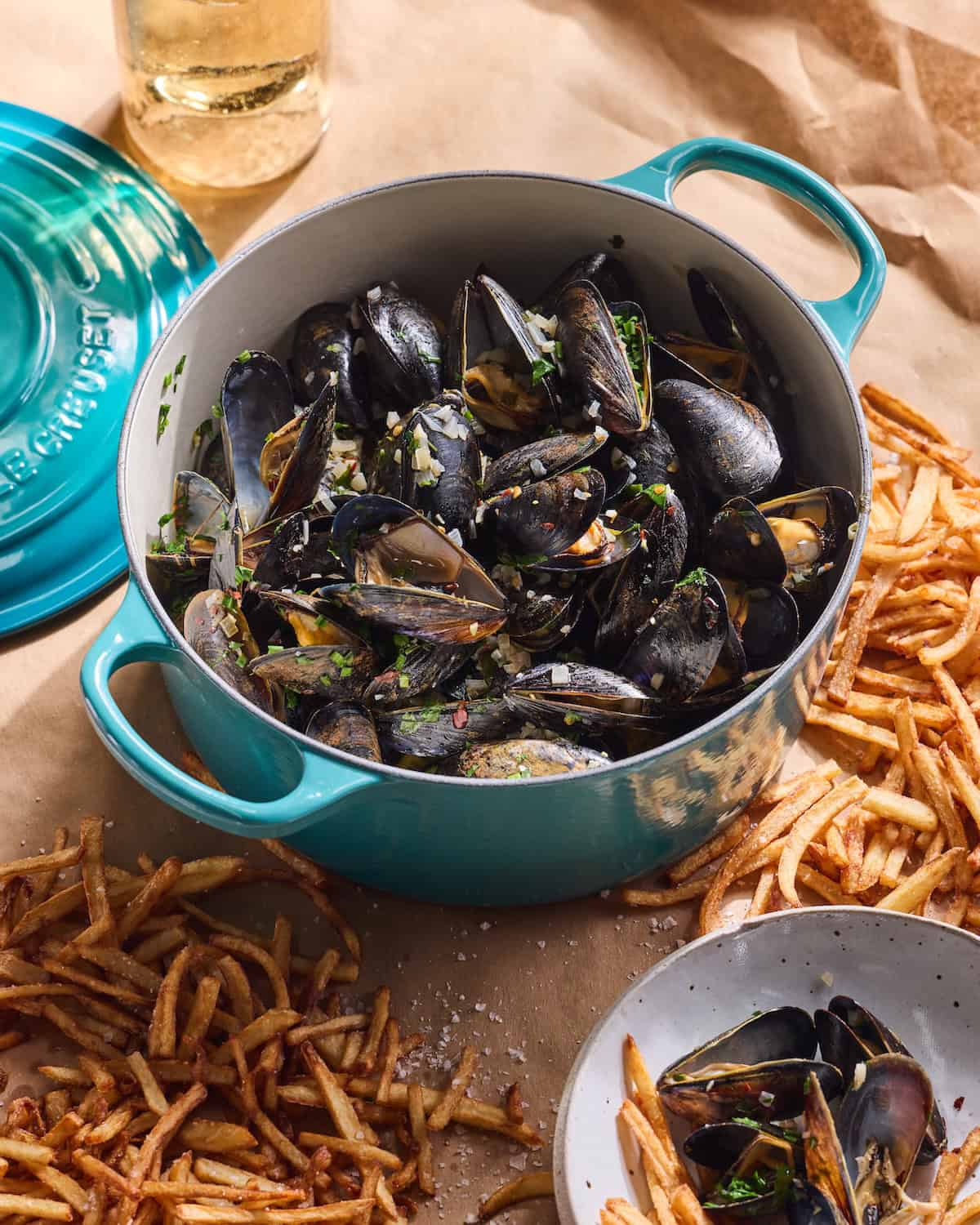 Steamed Mussels with White Wine served alongside tons of fresh frites!