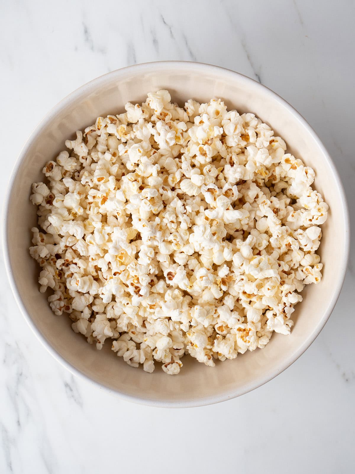 Bowl of fluffy popcorn kernels