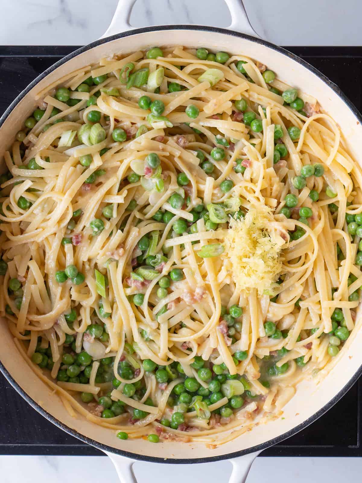 Pasta with peas and lemon zest