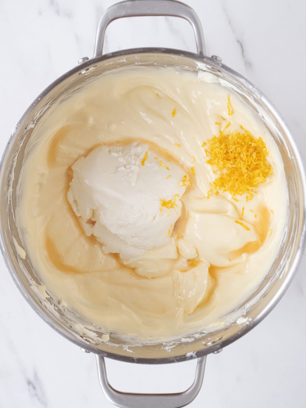 Creamy cheesecake mixture with lemon zest