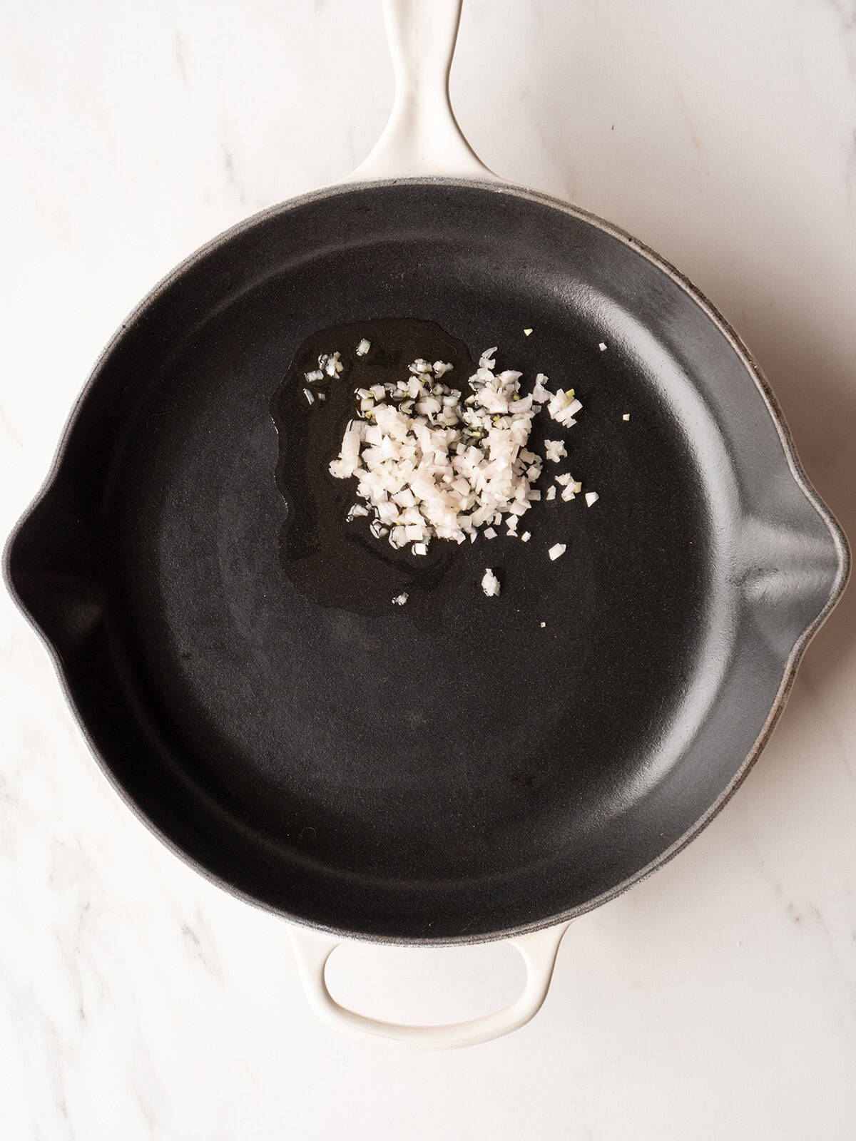 Oil and chopped shallots in skillet