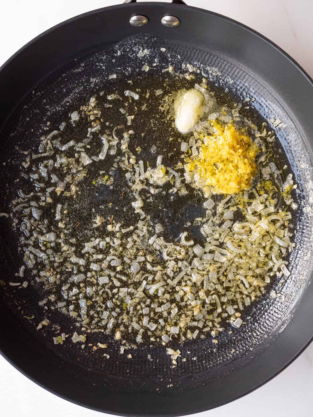 Sautéed onions, garlic and lemon zest in oil