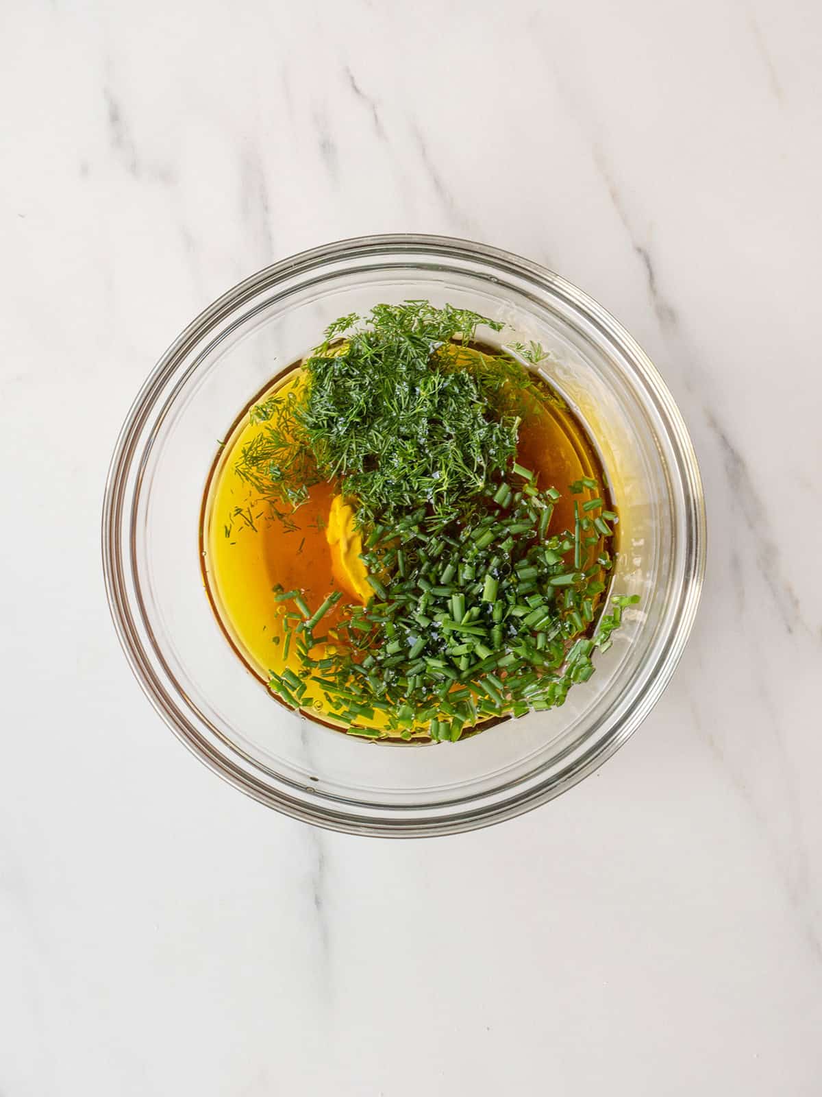 Bowl of herbs and olive oil