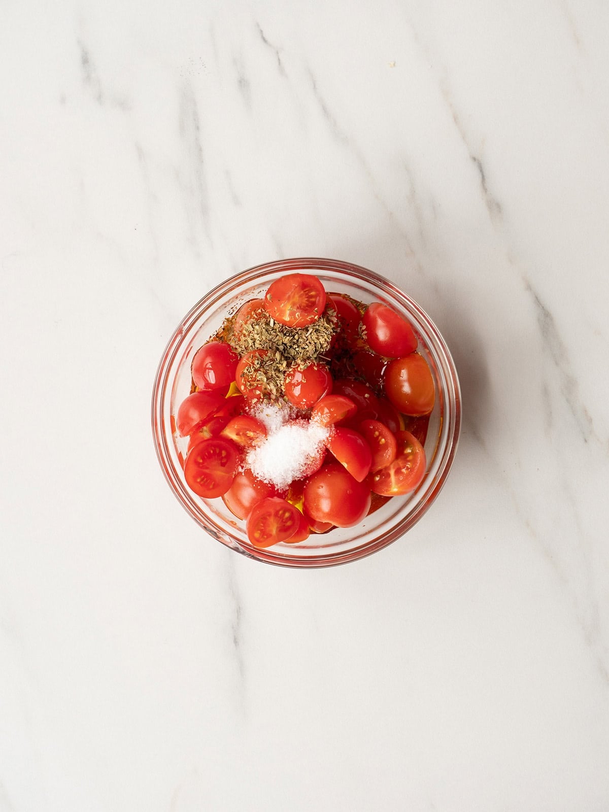 Cherry tomatoes with herbs and salt