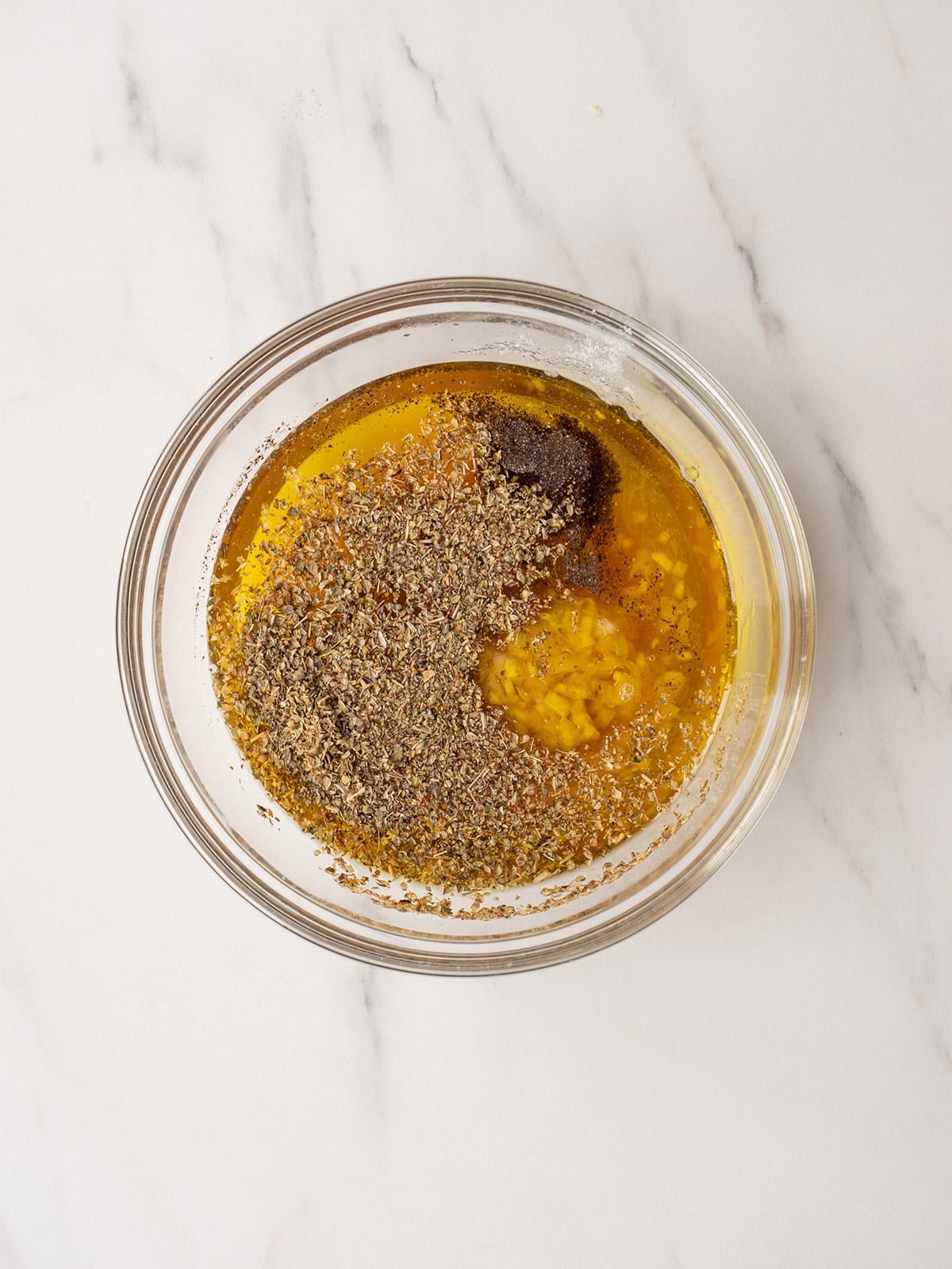 Bowl with oil and spices mixture