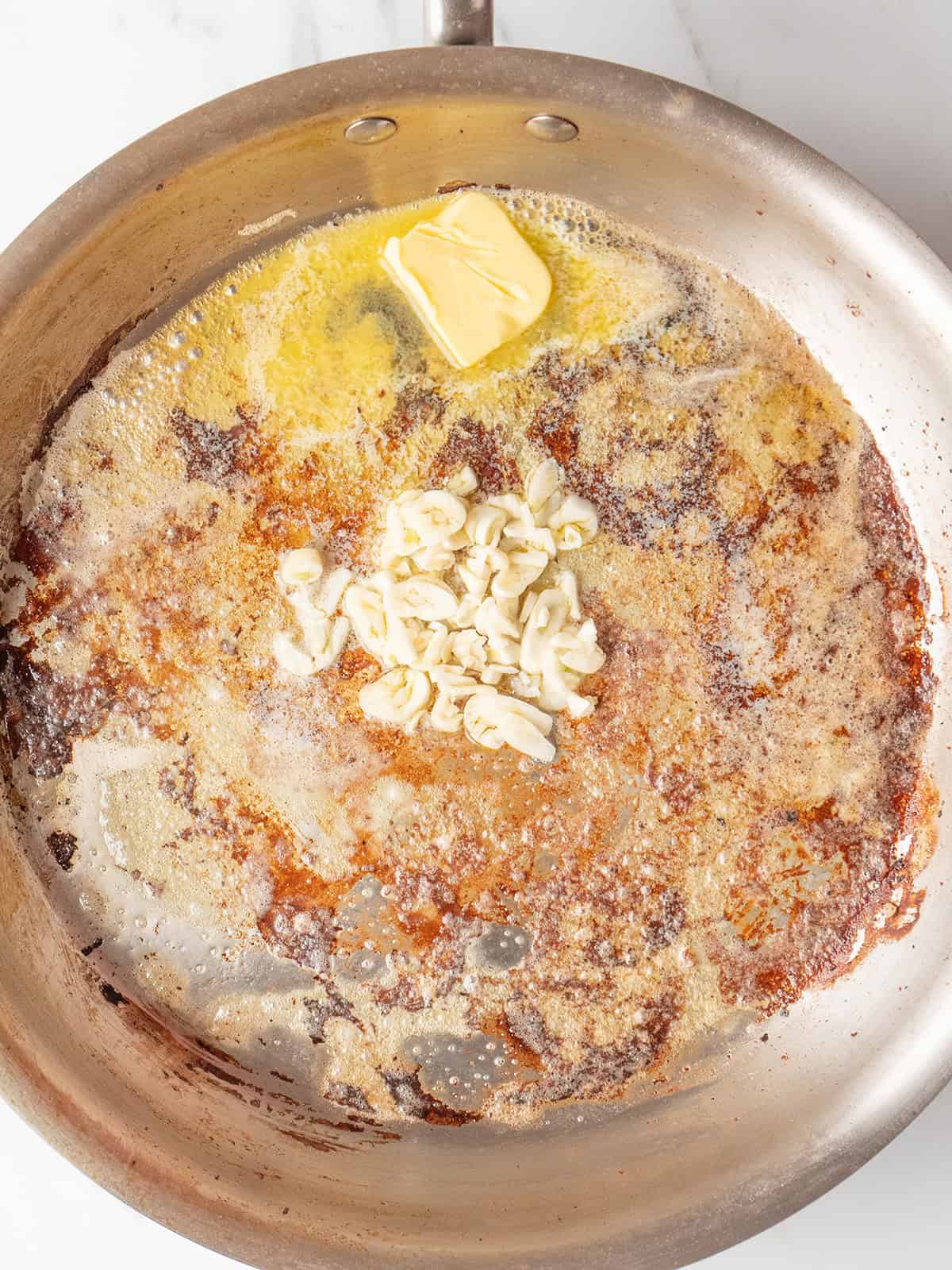 Butter and garlic in a skillet