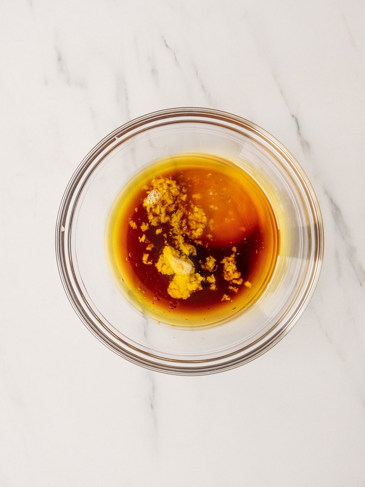 Bowl with sauce and ginger mixture