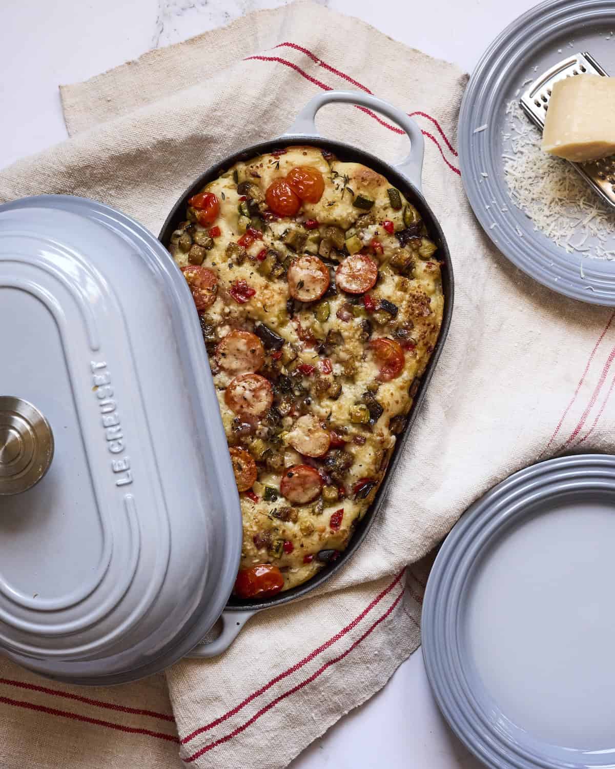 Baked dish with vegetables and sausage