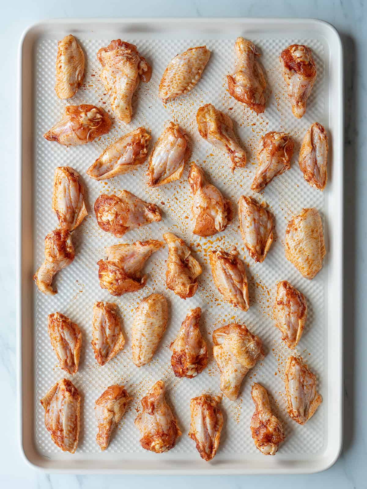 Tray of seasoned chicken wings