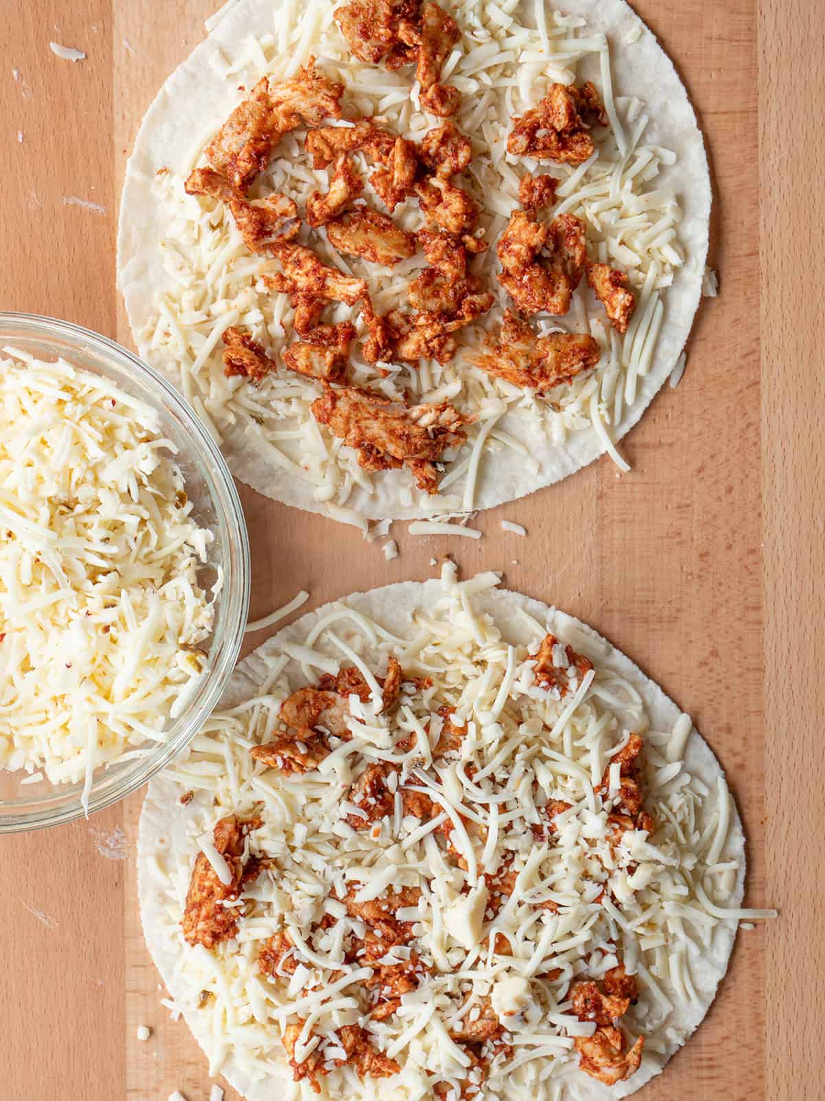 Tortillas with BBQ chicken and cheese