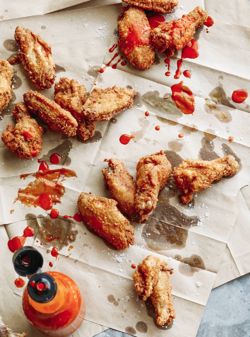 Fried Chicken Wings are mandatory for any kind of game day celebration! These are perfectly seasoned and extra delicious when slathered with hot sauce