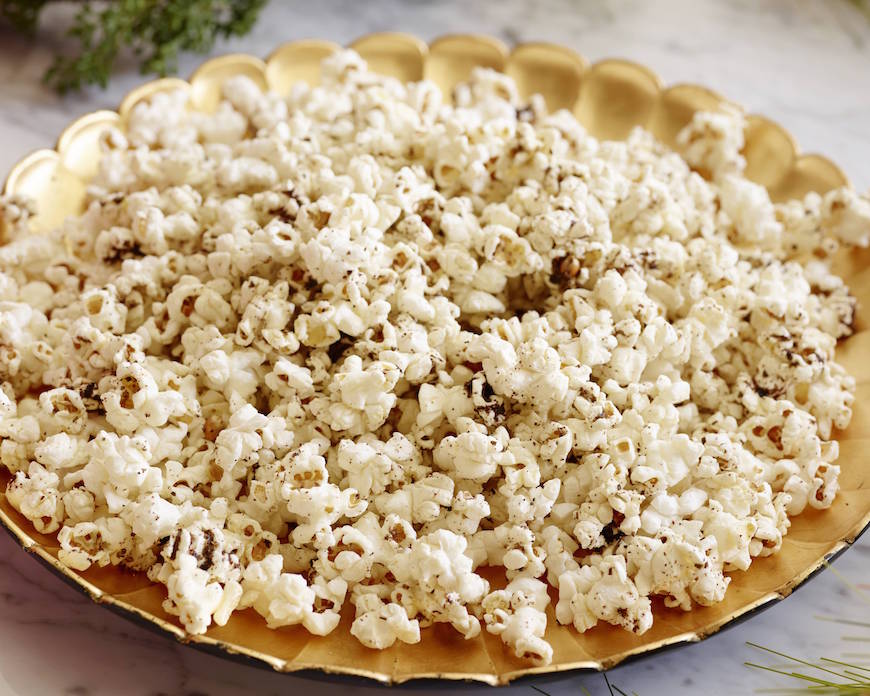 Whip up this super easy recipe for Parmesan Herb Spiced Popcorn for a savory snack any time of the year! It's seriously more addicting than Kettle Corn.